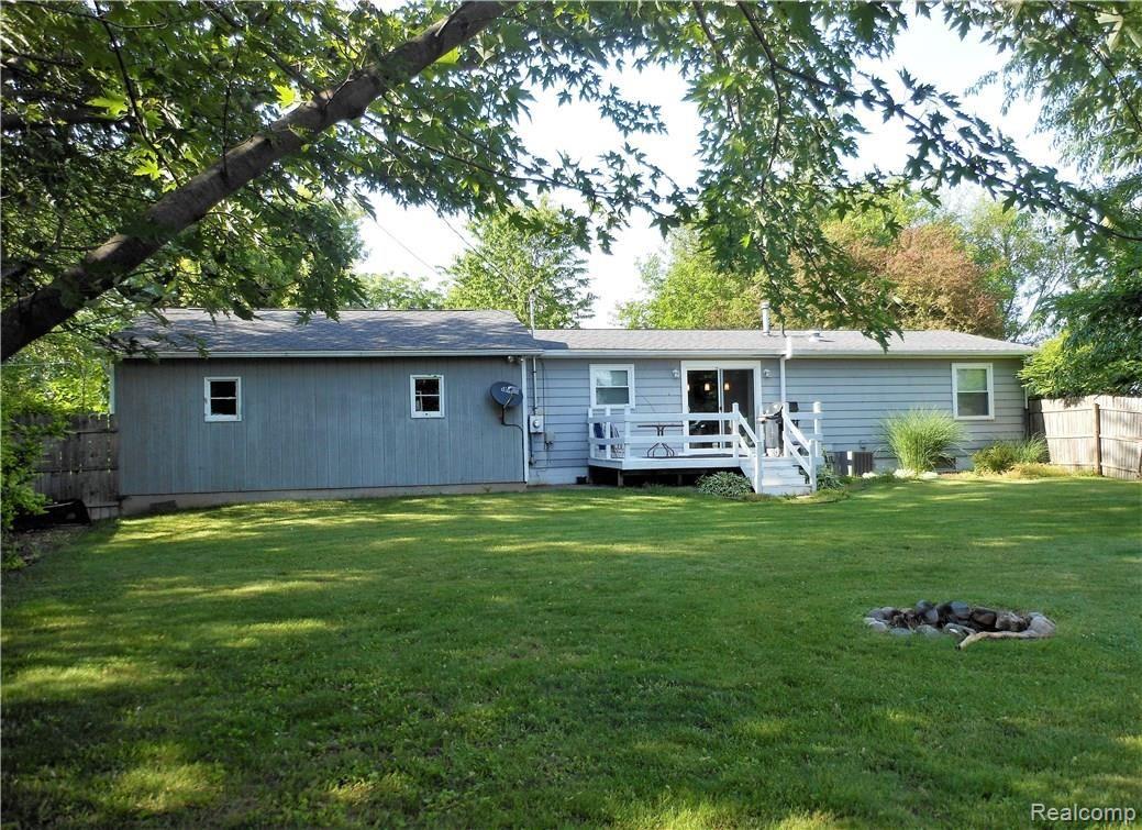 3201 West Britton Road Perry, MI 48872 - Photo 21 of 21 REAR OF HOME, FIREPIT