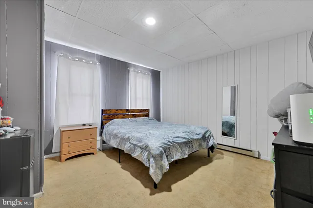 a kitchen with a sink and a refrigerator