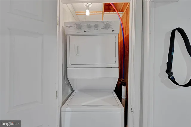 a bathroom with a sink toilet and mirror