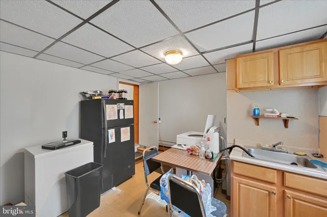 a room with a couch and a storage space