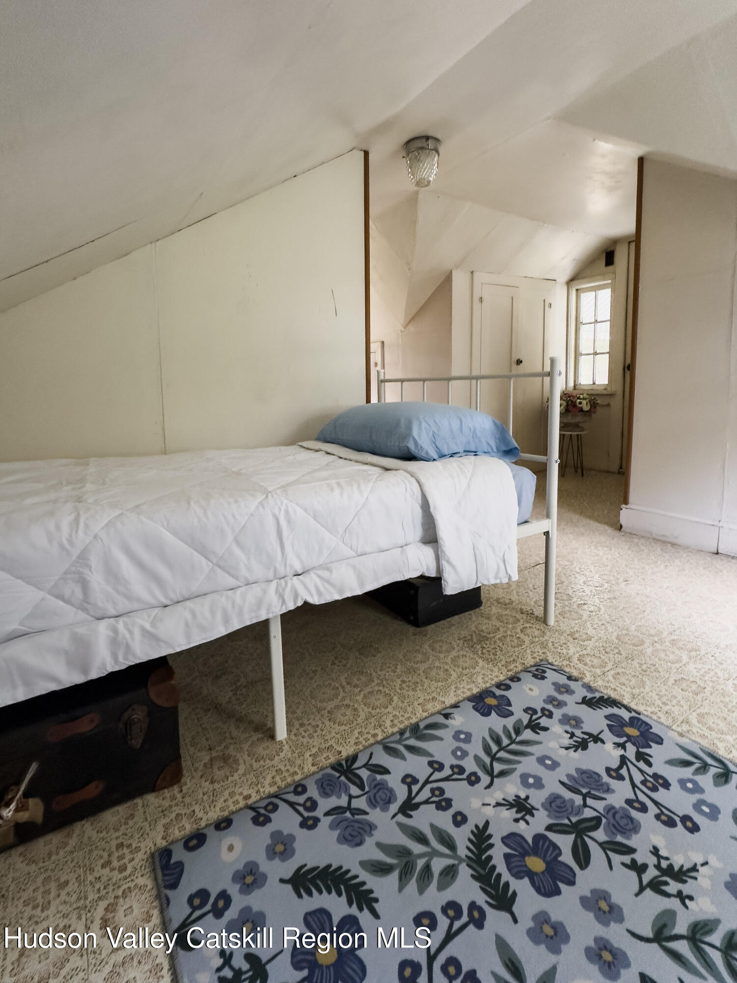 4359 County Route 81 Greenville, NY 12083 - Photo 19 of 26 a bedroom with a bed and wooden floor