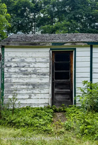 a view of outdoor space and has windows