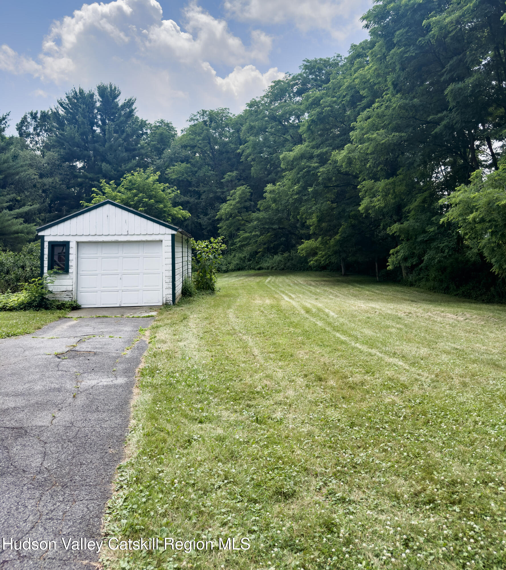 4359 County Route 81 Greenville, NY 12083 - Photo 24 of 26 a front view of a house with yard and green space