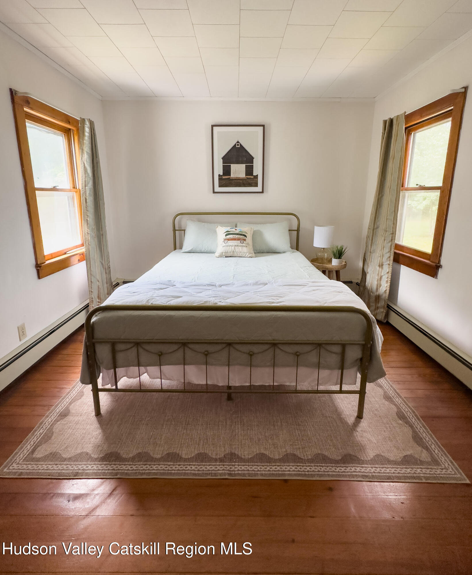 4359 County Route 81 Greenville, NY 12083 - Photo 9 of 26 a bedroom with a bed window and wall painting