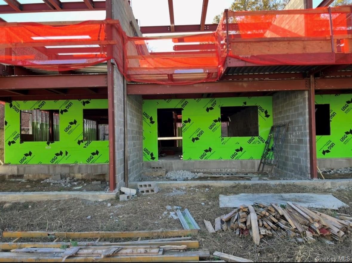 10603 49th Avenue Queens, NY 11368 - Photo 27 of 32 View of front facade featuring concrete block siding