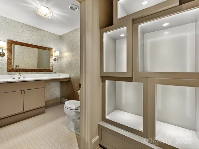 a bedroom with a large bed and a large window