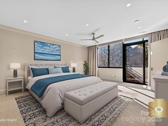 a large bathroom with a granite countertop sink a mirror and a shower