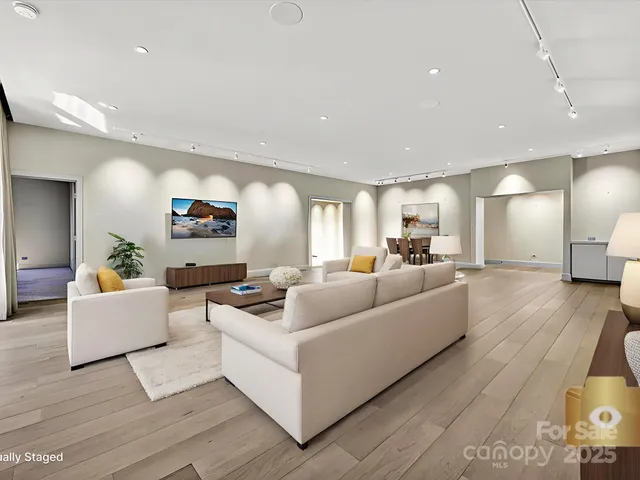 a view of a livingroom with wooden floor