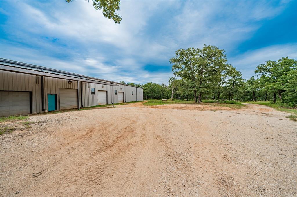 1990 Jim Harry Loop Sunset, TX 76270 - Photo 12 of 40 a view of a backyard of the house