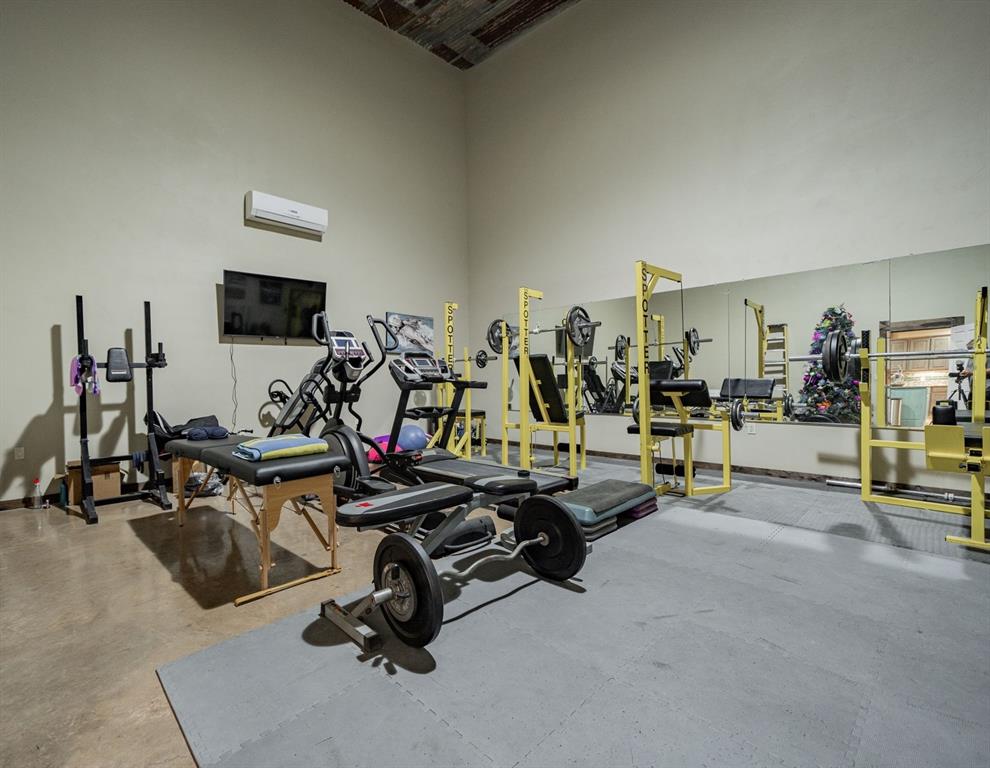 1990 Jim Harry Loop Sunset, TX 76270 - Photo 22 of 40 a view of a room with gym equipment