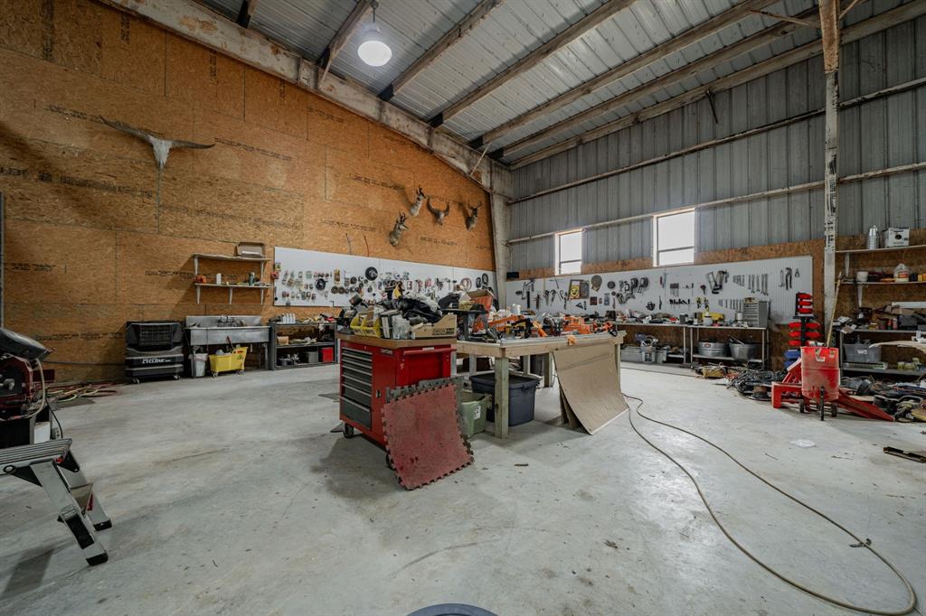 1990 Jim Harry Loop Sunset, TX 76270 - Photo 10 of 40 a room with lots of furniture and clutter