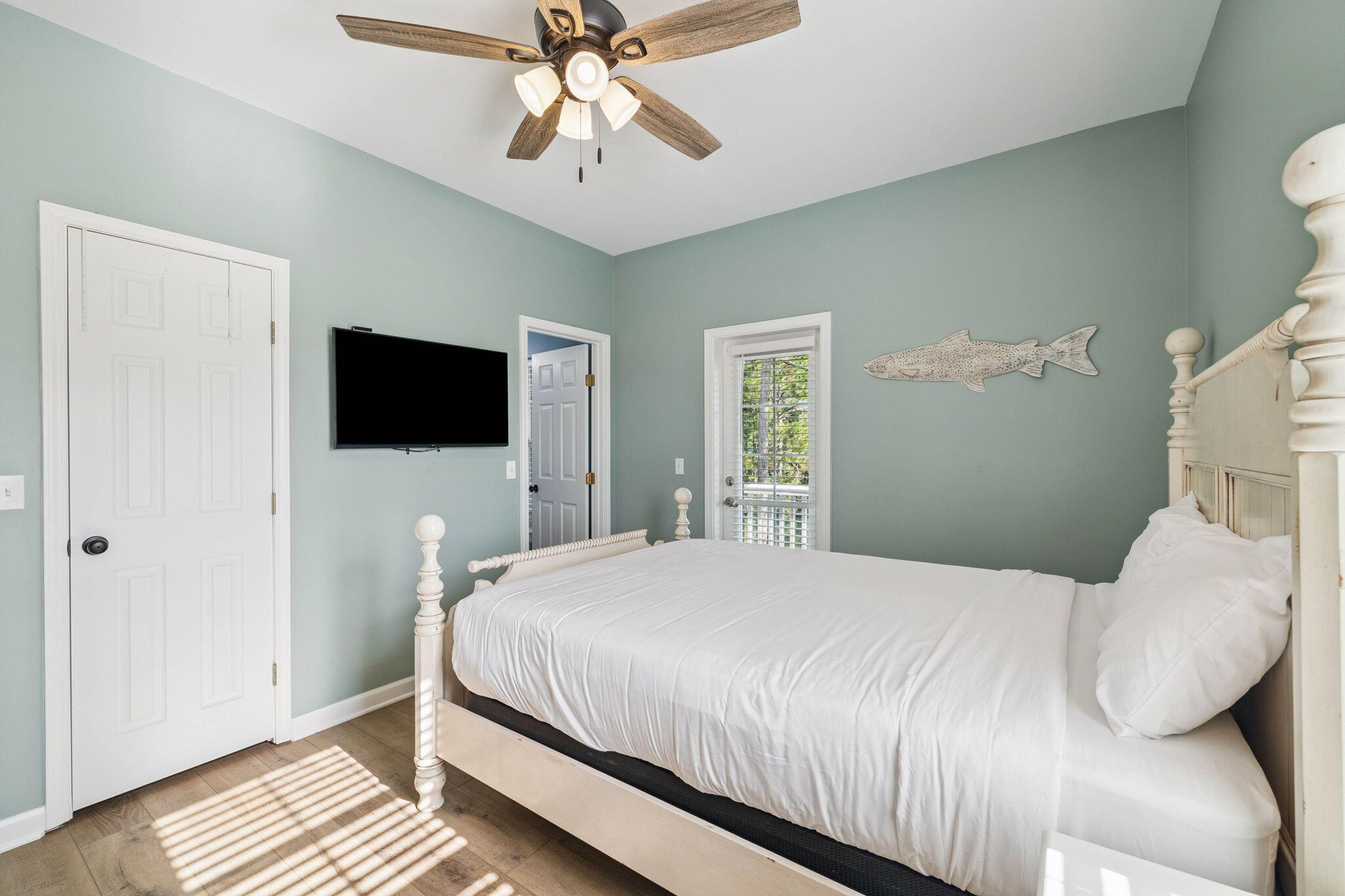 198 Somerset Bridge Road, Unit 114 Santa Rosa Beach, FL 32459 - Photo 14 of 28 a bedroom with a bed and a flat screen tv
