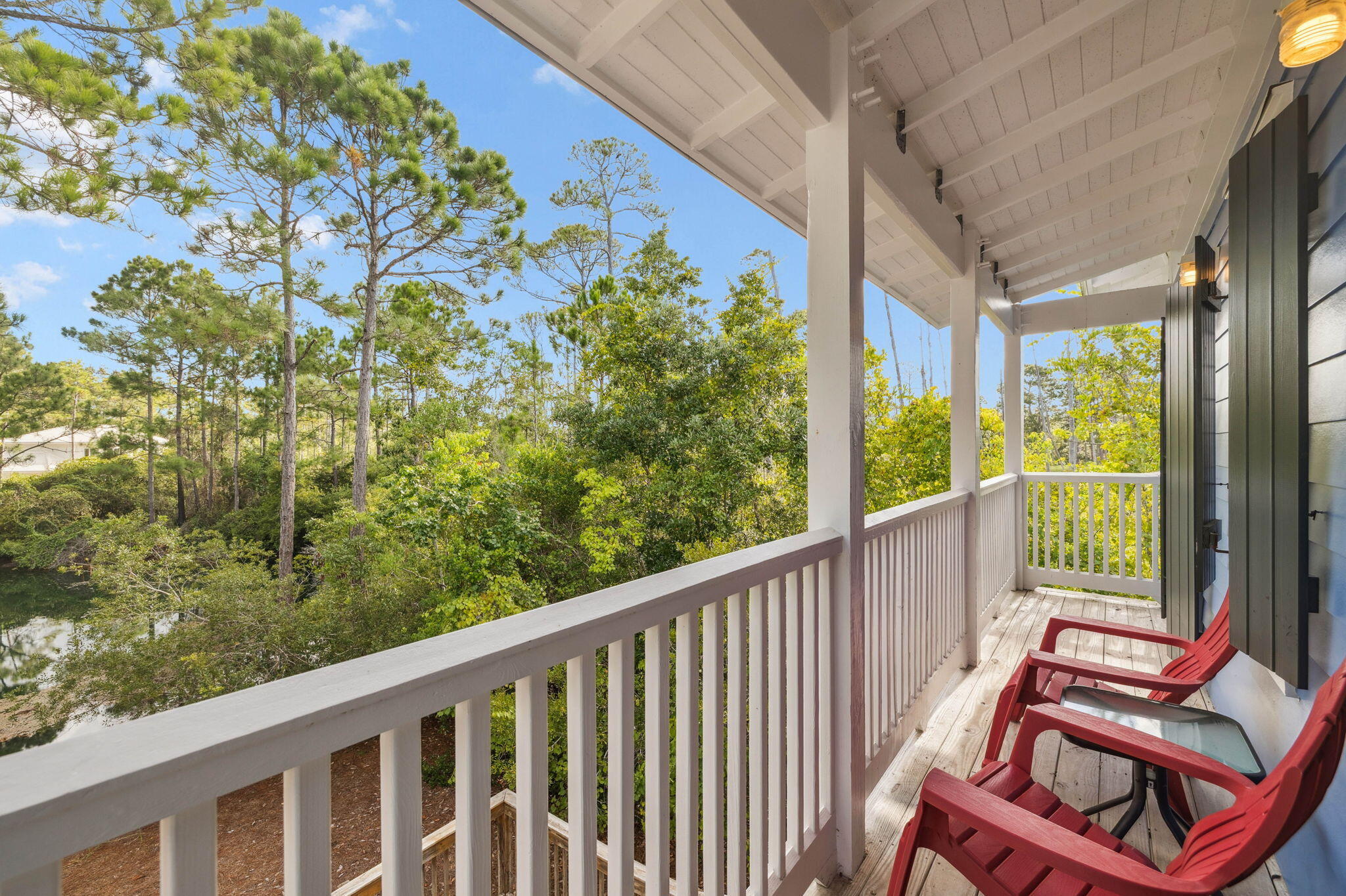 198 Somerset Bridge Road, Unit 114 Santa Rosa Beach, FL 32459 - Photo 22 of 28 a balcony with wooden floor and outdoor space