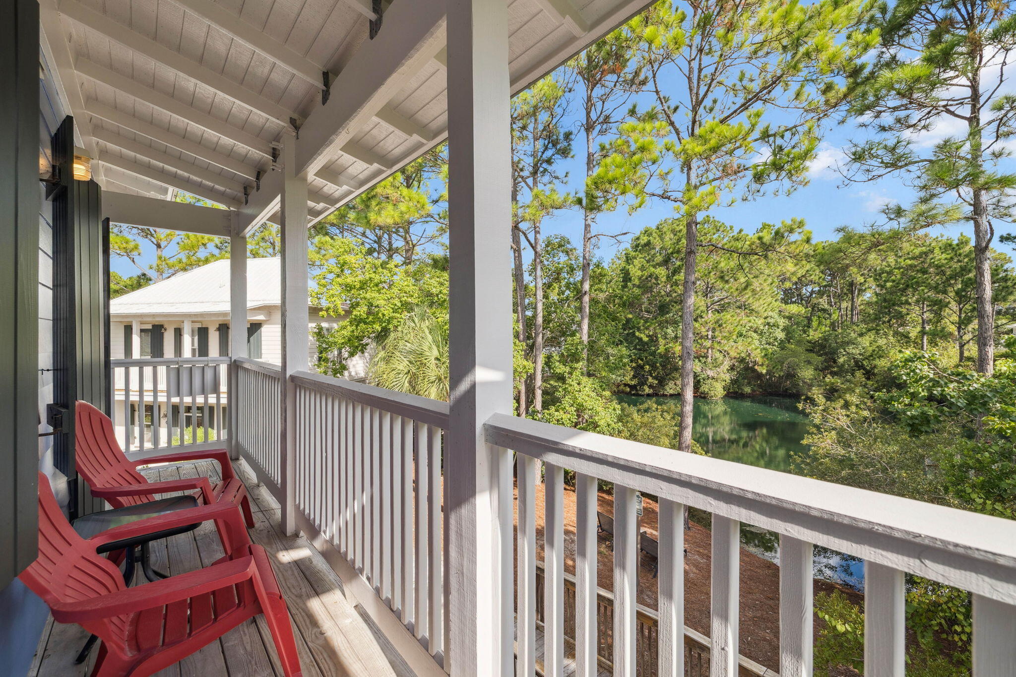 198 Somerset Bridge Road, Unit 114 Santa Rosa Beach, FL 32459 - Photo 23 of 28 a view of a two chairs in the balcony