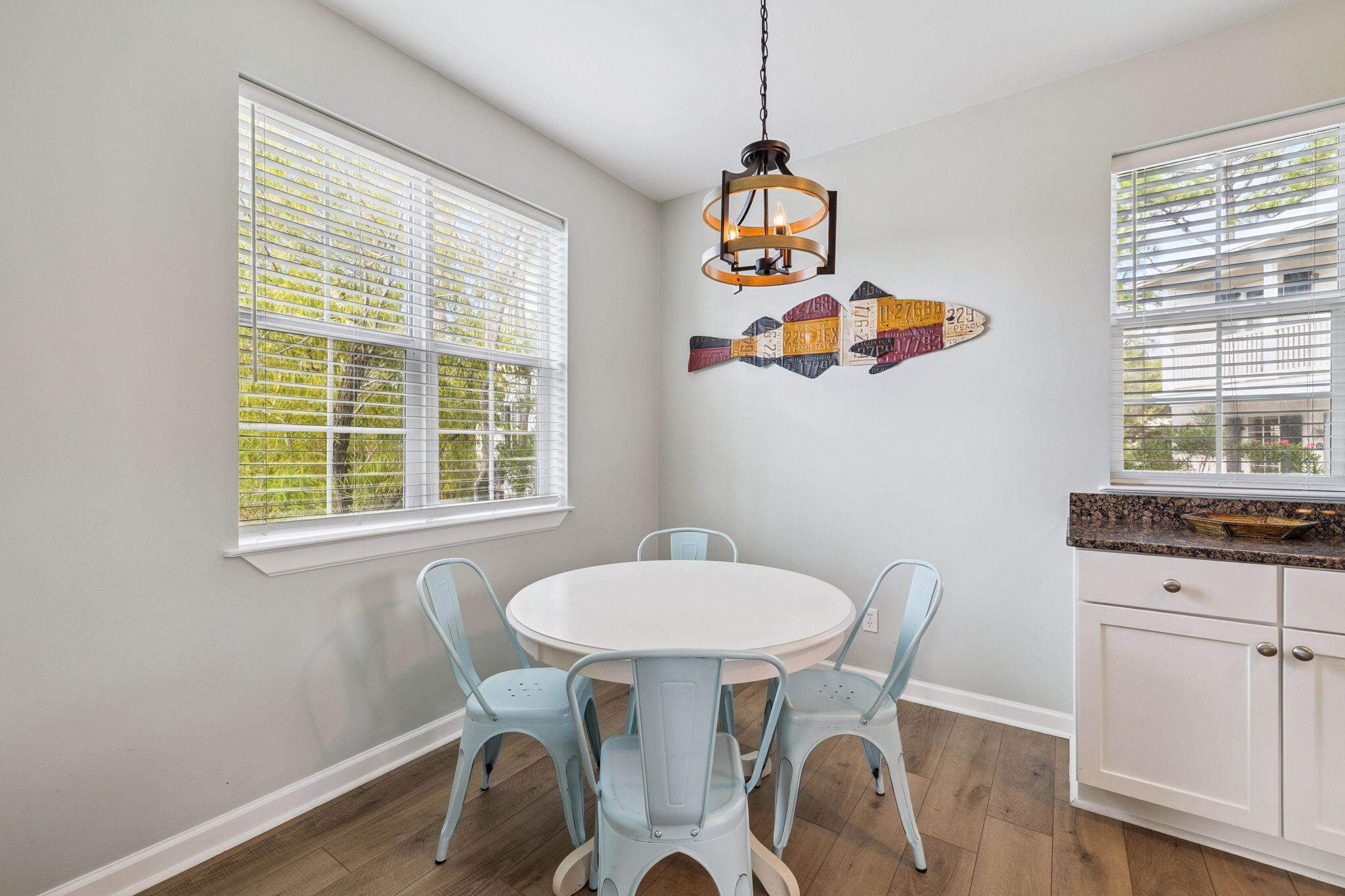 198 Somerset Bridge Road, Unit 114 Santa Rosa Beach, FL 32459 - Photo 9 of 28 a dining room with a table and chairs