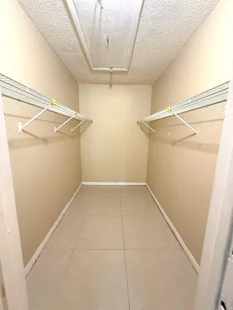 a bathroom with a toilet and a bathtub