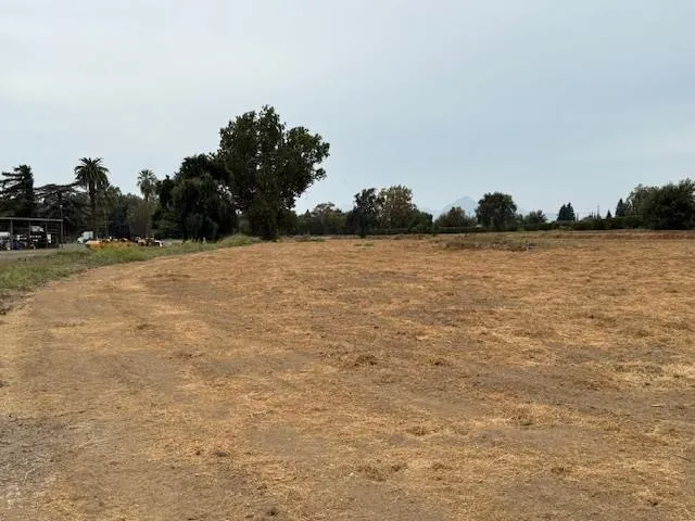 a view of outdoor space with water fountain