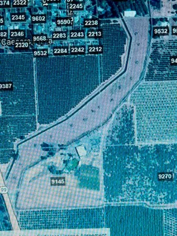 a view of lake with mountain in background