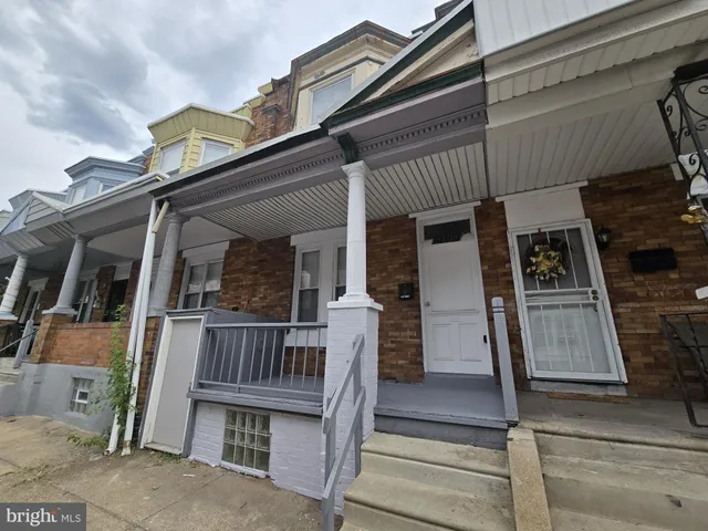 front view of a house with large windows