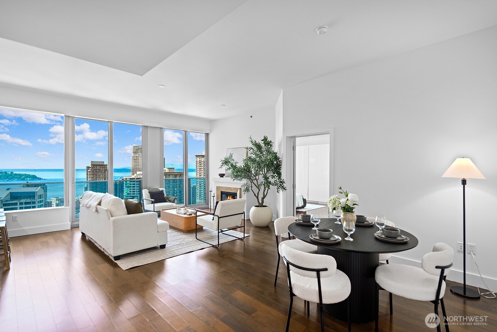 737 Olive Way, Unit 3509 Seattle, WA 98101 - Photo 28 of 31 a living room with furniture and a large window