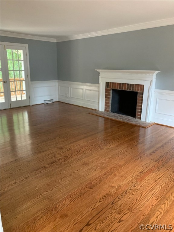 13621 Thorngate Road Midlothian, VA 23113 - Photo 20 of 46 an empty room with wooden floor fireplace and windows