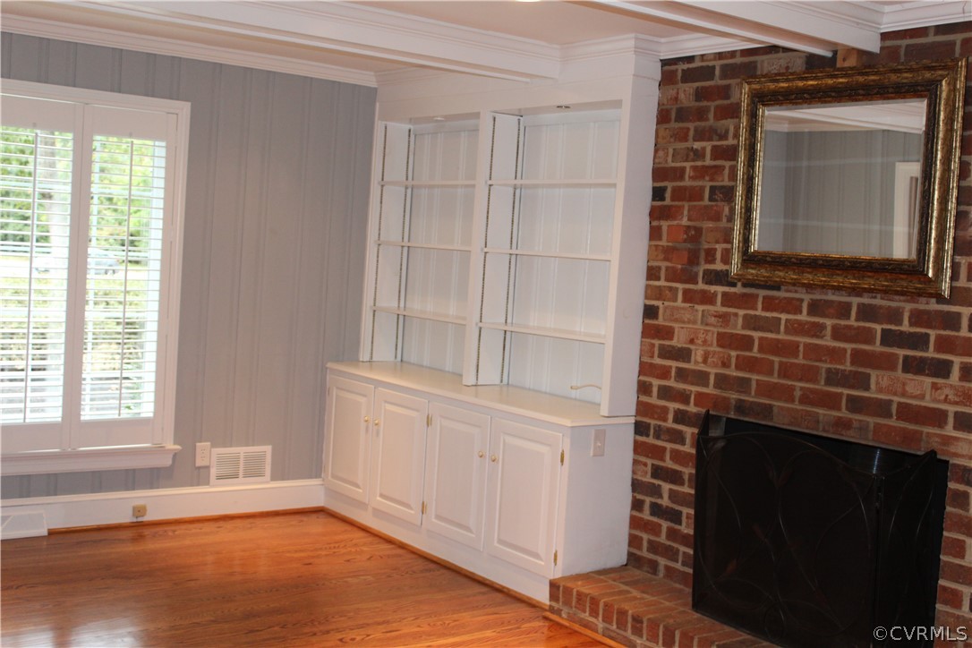 13621 Thorngate Road Midlothian, VA 23113 - Photo 25 of 46 a view of an empty room with a fireplace and a window