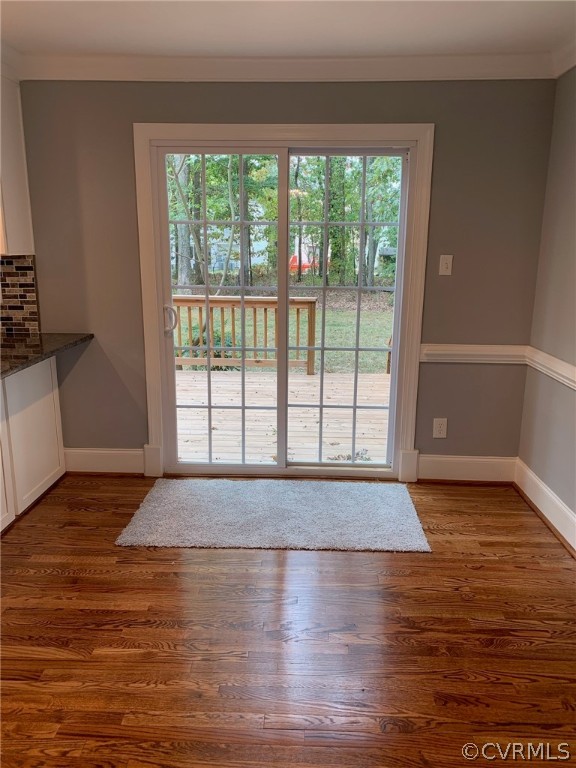 13621 Thorngate Road Midlothian, VA 23113 - Photo 31 of 46 a view of an empty room with wooden floor and a window