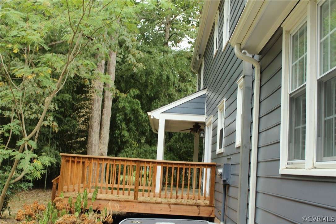 13621 Thorngate Road Midlothian, VA 23113 - Photo 9 of 46 a view of a wooden house with a small yard