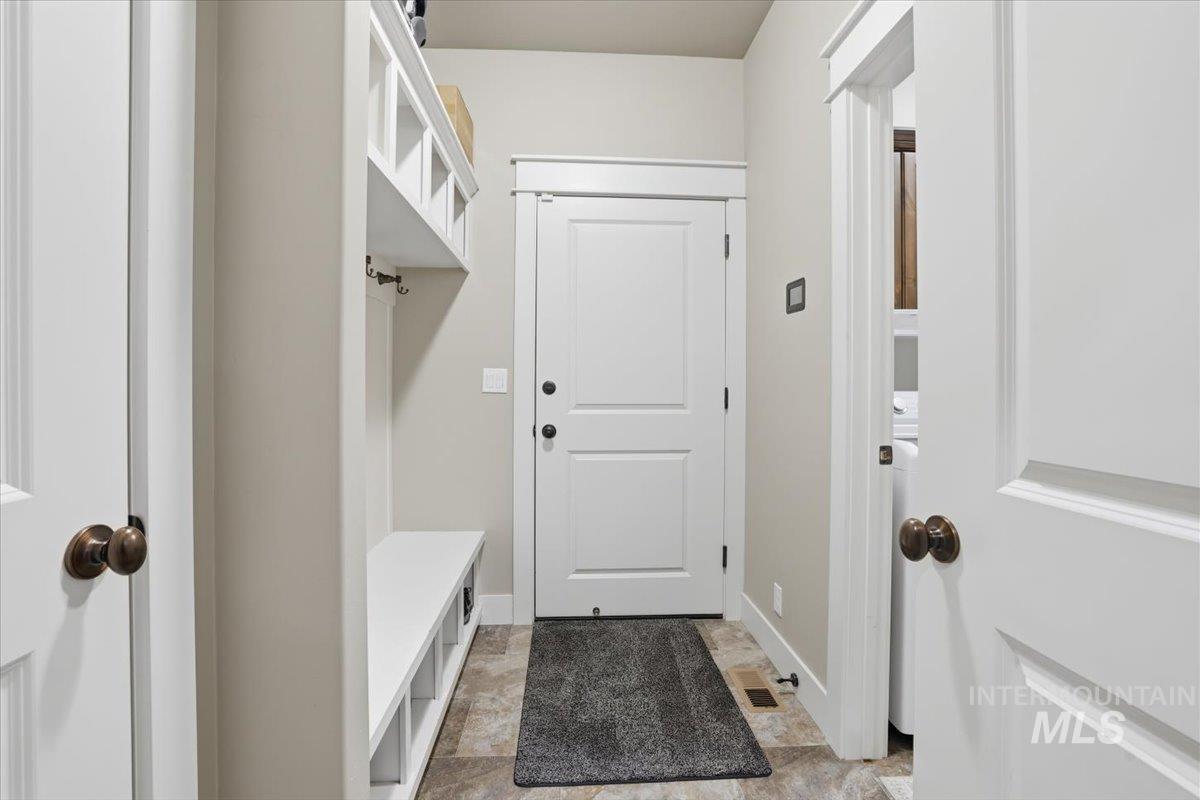 4604 Middlesboro Way Caldwell, ID 83607 - Photo 28 of 43 Mudroom with stone finish floors and baseboards