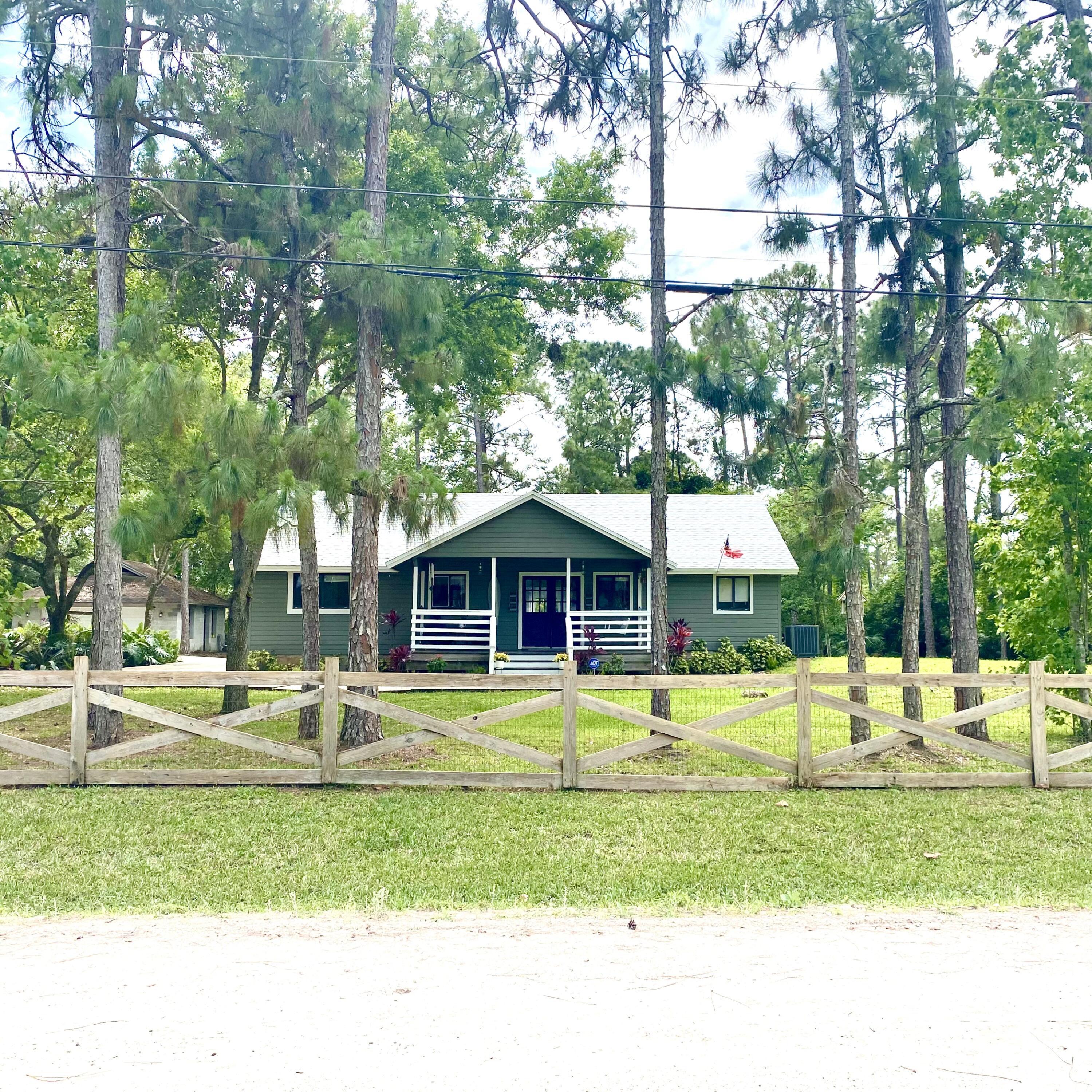 13130 85th Road North The Acreage, FL 33412 - Photo 2 of 34 9E0C874E-A71E-47CF-987B-E68D444256FE