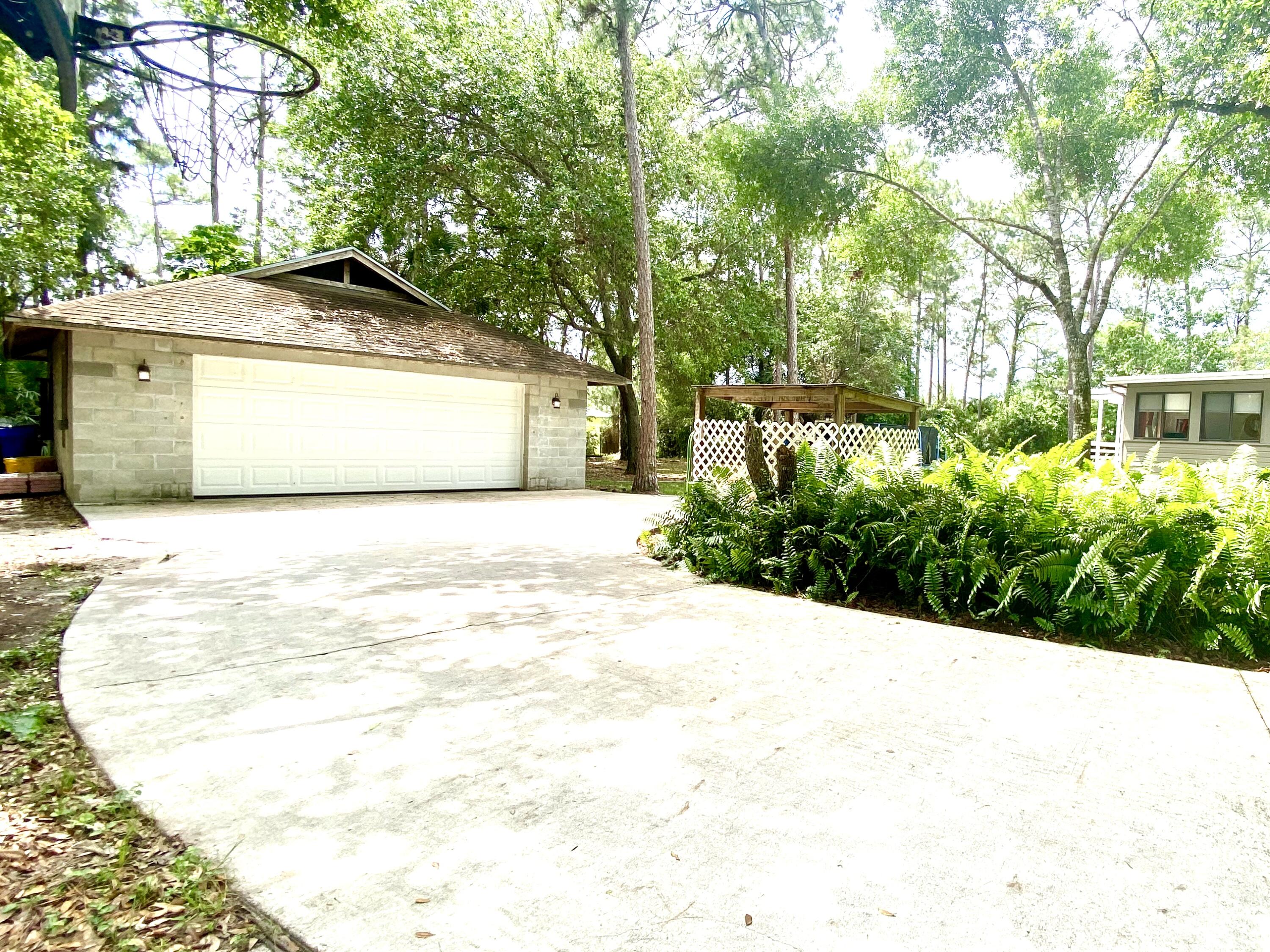 13130 85th Road North The Acreage, FL 33412 - Photo 33 of 34 C9D3F69B-D312-4C2F-9EDE-B5FA9D538FE0