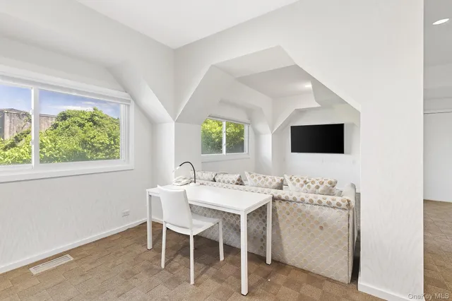 an aerial view of a house with a garden