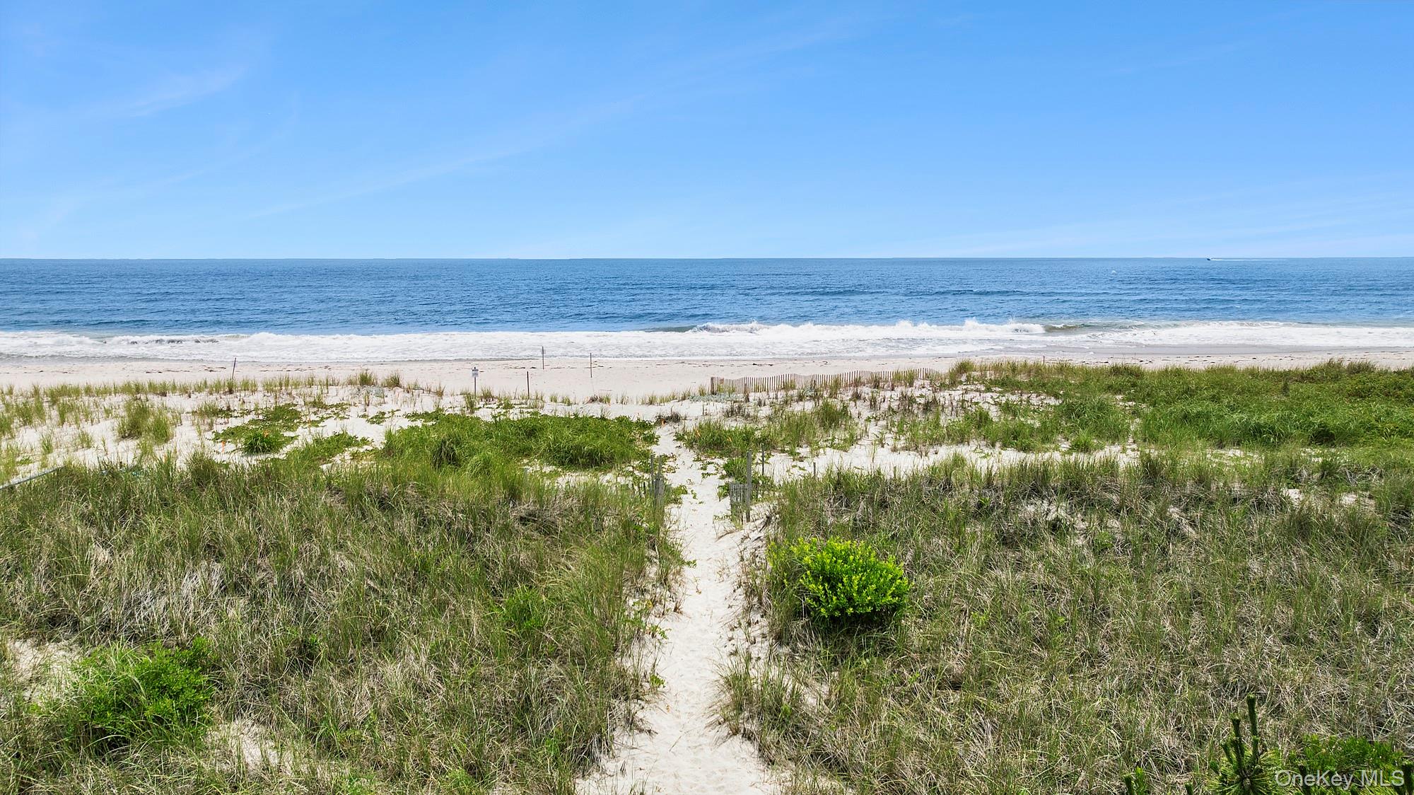 63-65 Dune Road Quogue, NY 11959 - Photo 23 of 29 a view of an ocean