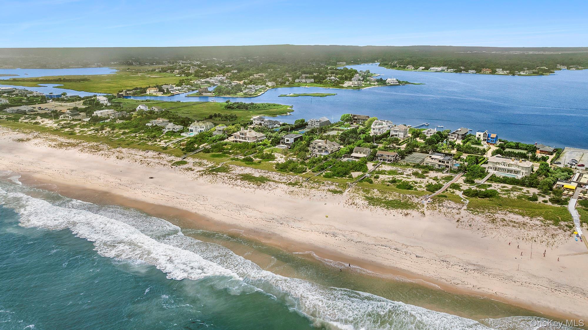 63-65 Dune Road Quogue, NY 11959 - Photo 25 of 29 an aerial view of beach and ocean