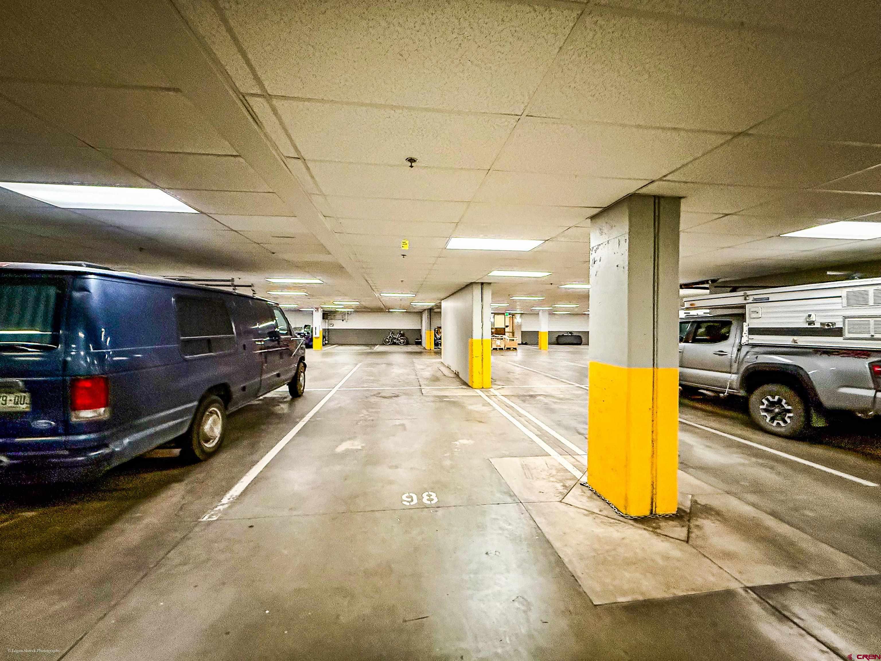 555 Rivergate Lane, Unit B2139 Durango, CO 81301 - Photo 31 of 32 a view of parking garage with cars parked