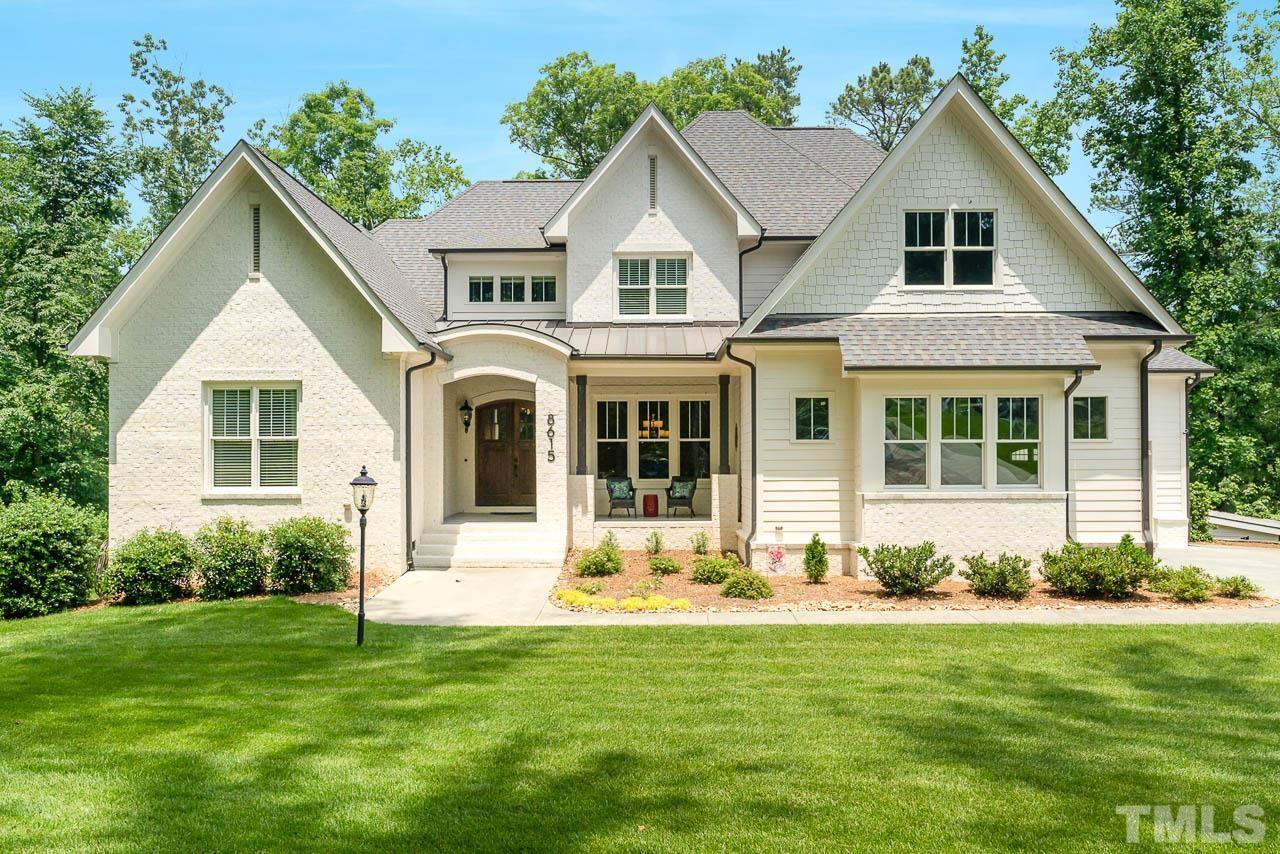 8615 Oneal Road Raleigh, NC 27613 - Photo 2 of 58 a front view of a house with a yard