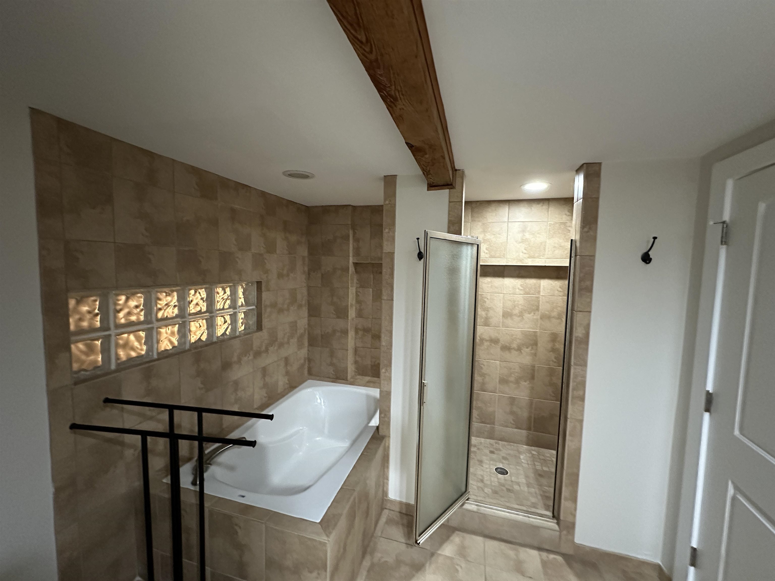 435 South Front Street, Unit 109 Memphis, TN 38103 - Photo 12 of 25 Full bathroom featuring a shower stall, a bath, and recessed lighting