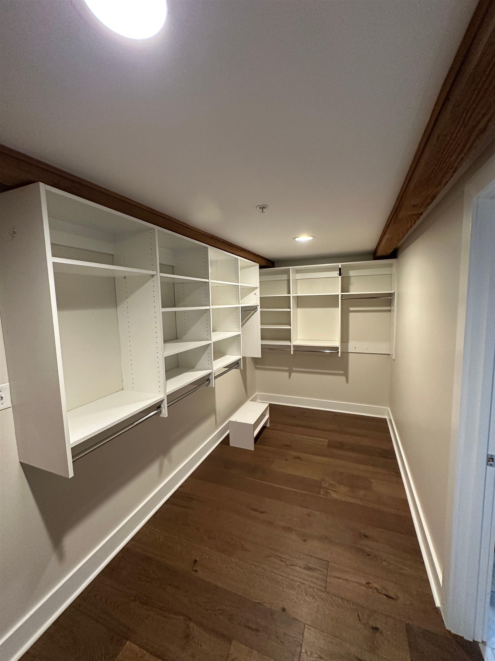 435 South Front Street, Unit 109 Memphis, TN 38103 - Photo 14 of 25 Walk in closet featuring dark wood-style floors