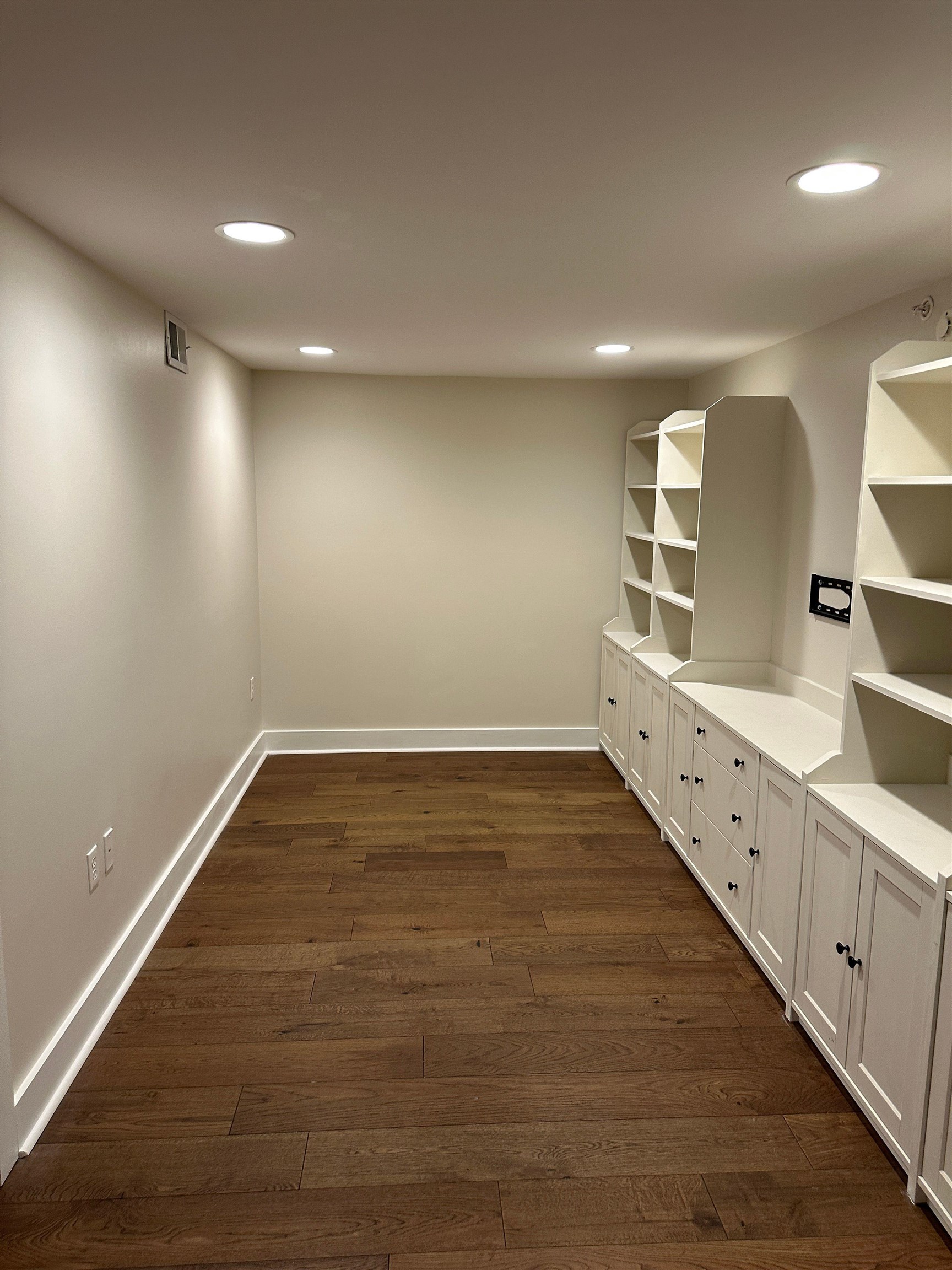 435 South Front Street, Unit 109 Memphis, TN 38103 - Photo 20 of 25 Interior space with recessed lighting and dark wood-style floors