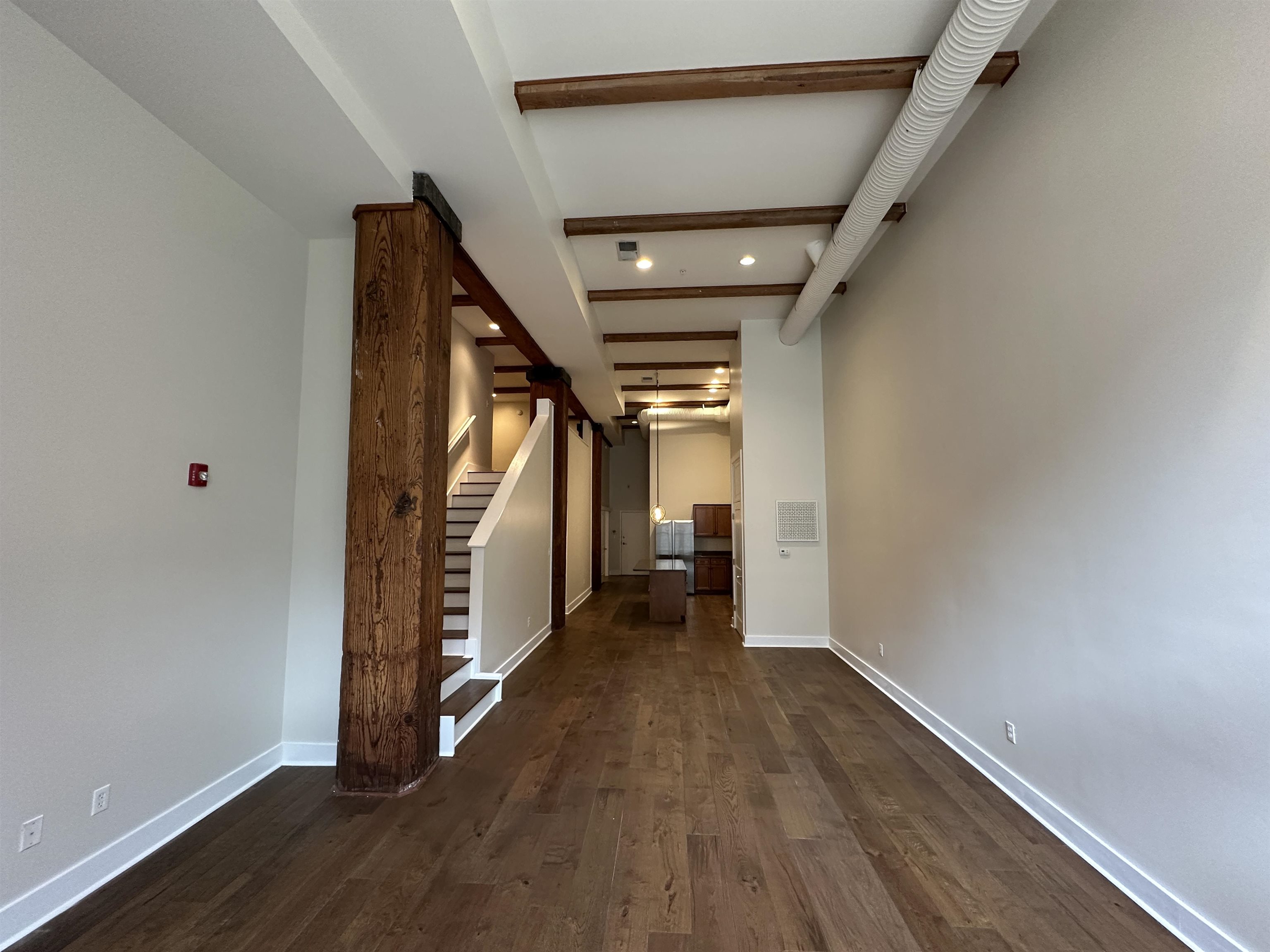 435 South Front Street, Unit 109 Memphis, TN 38103 - Photo 8 of 25 Hallway featuring dark wood-type flooring and recessed lighting