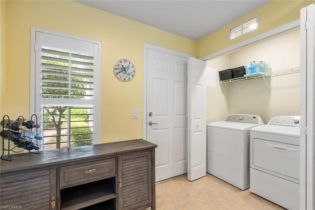 5796 Declaration Court Ave Maria, FL 34142 - Photo 23 of 49 a view of storage and utility room with a washer dryer