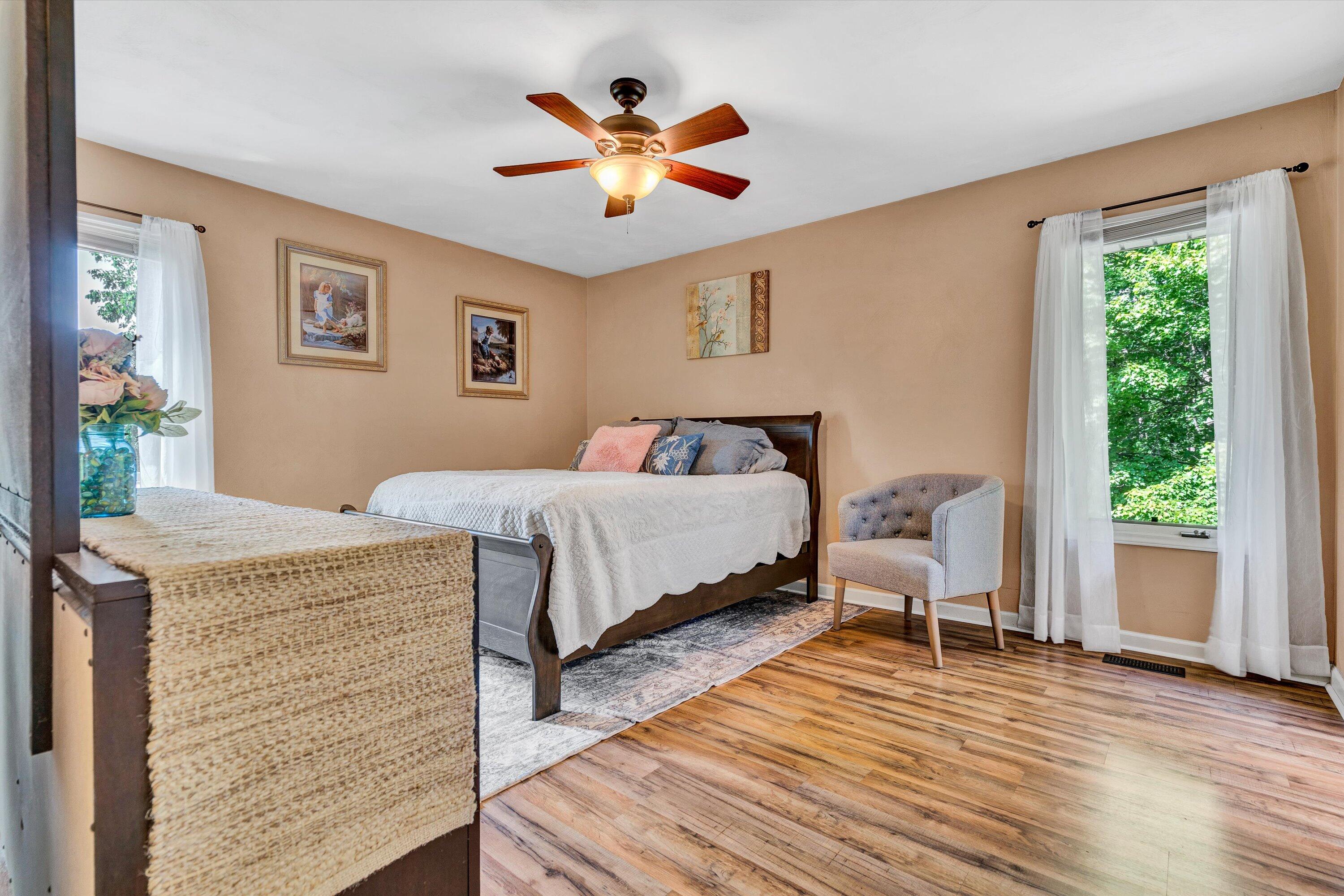 164 Deer Track Cloverdale, VA 24077 - Photo 12 of 28 a bedroom with a bed and a table