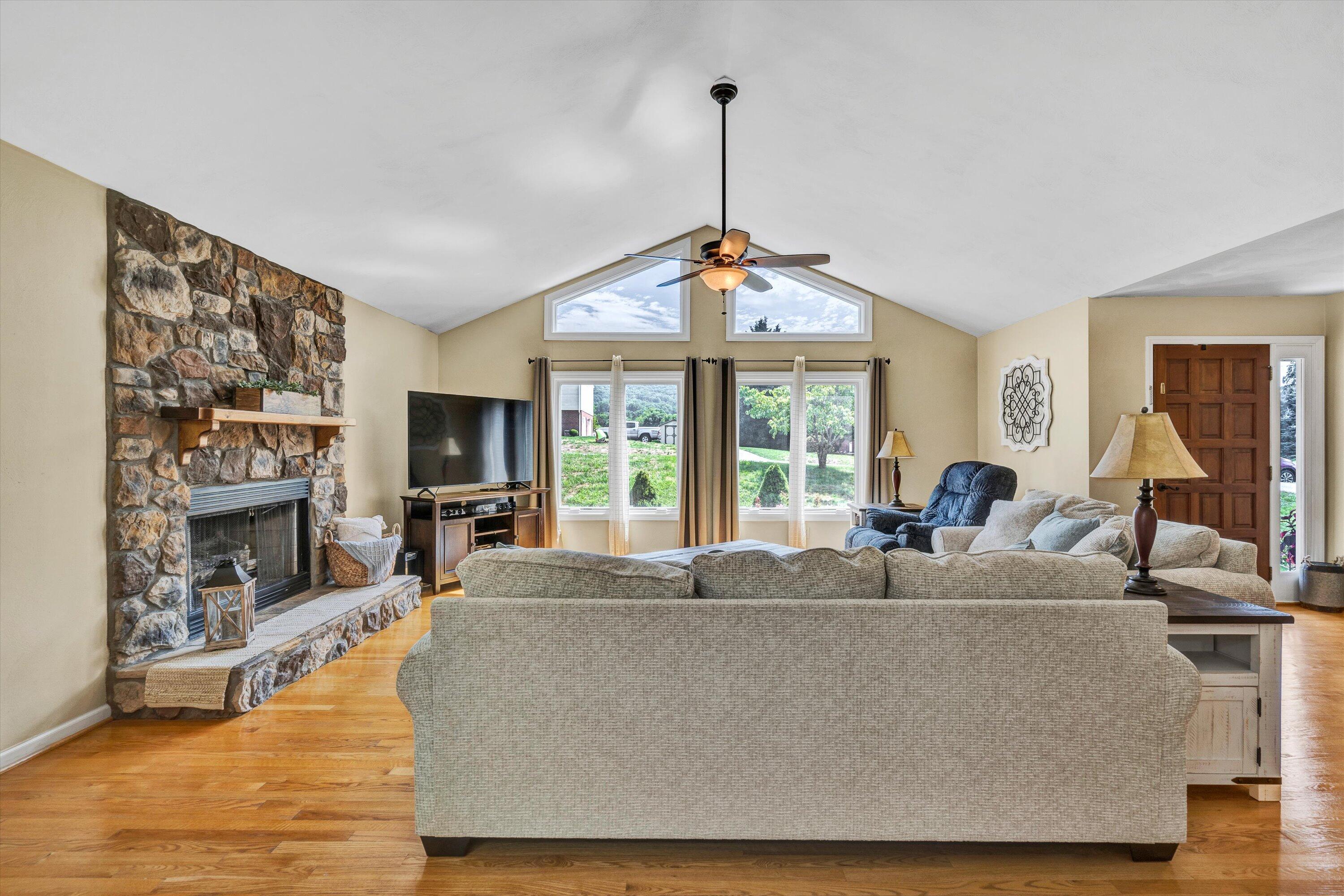 164 Deer Track Cloverdale, VA 24077 - Photo 4 of 28 a living room with furniture and a chandelier