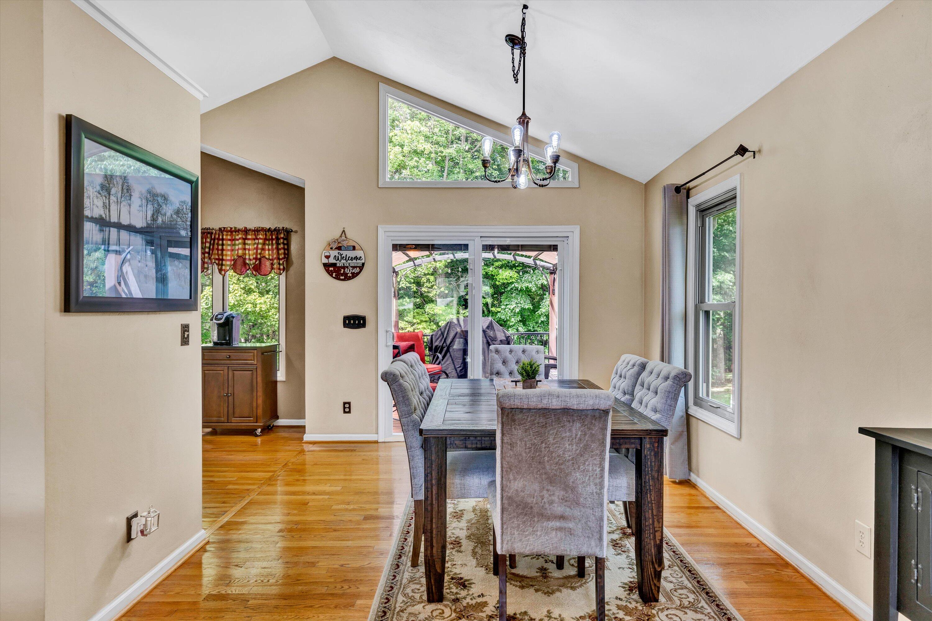164 Deer Track Cloverdale, VA 24077 - Photo 6 of 28 a view of a dining room with furniture window and wooden floor