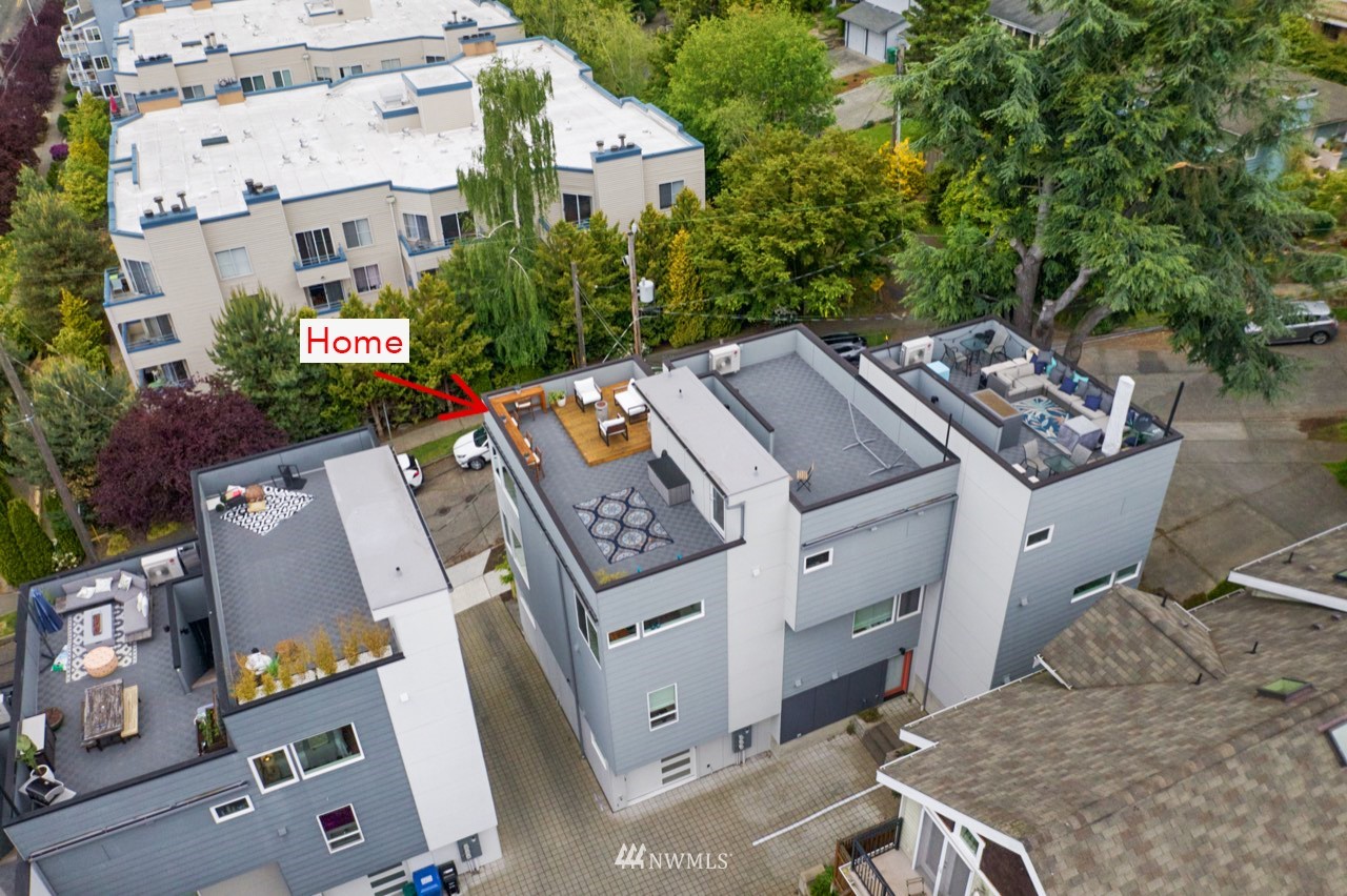 4205 Southwest Frontenac Street Seattle, WA 98136 - Photo 34 of 39 an aerial view of a house with balcony