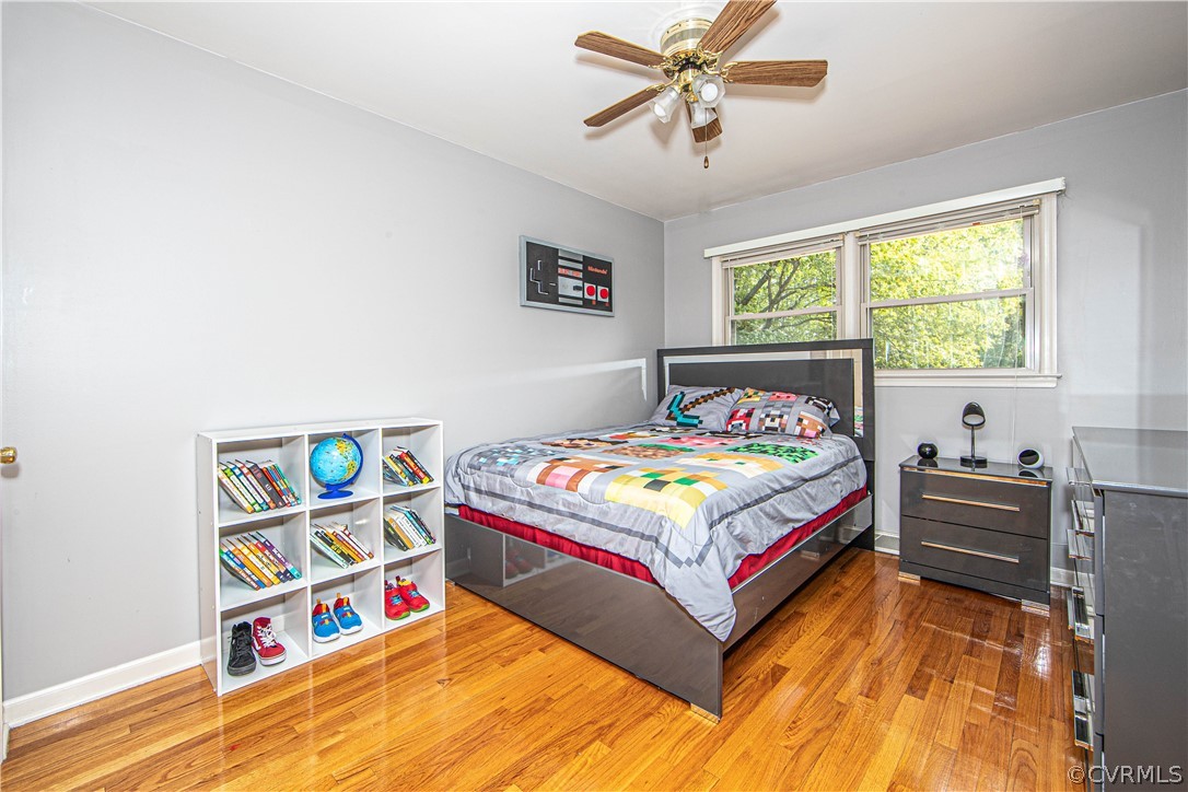 5605 Allin Road Prince George, VA 23875 - Photo 12 of 19 The spacious third bedroom offers wood floors and a ceiling fan.