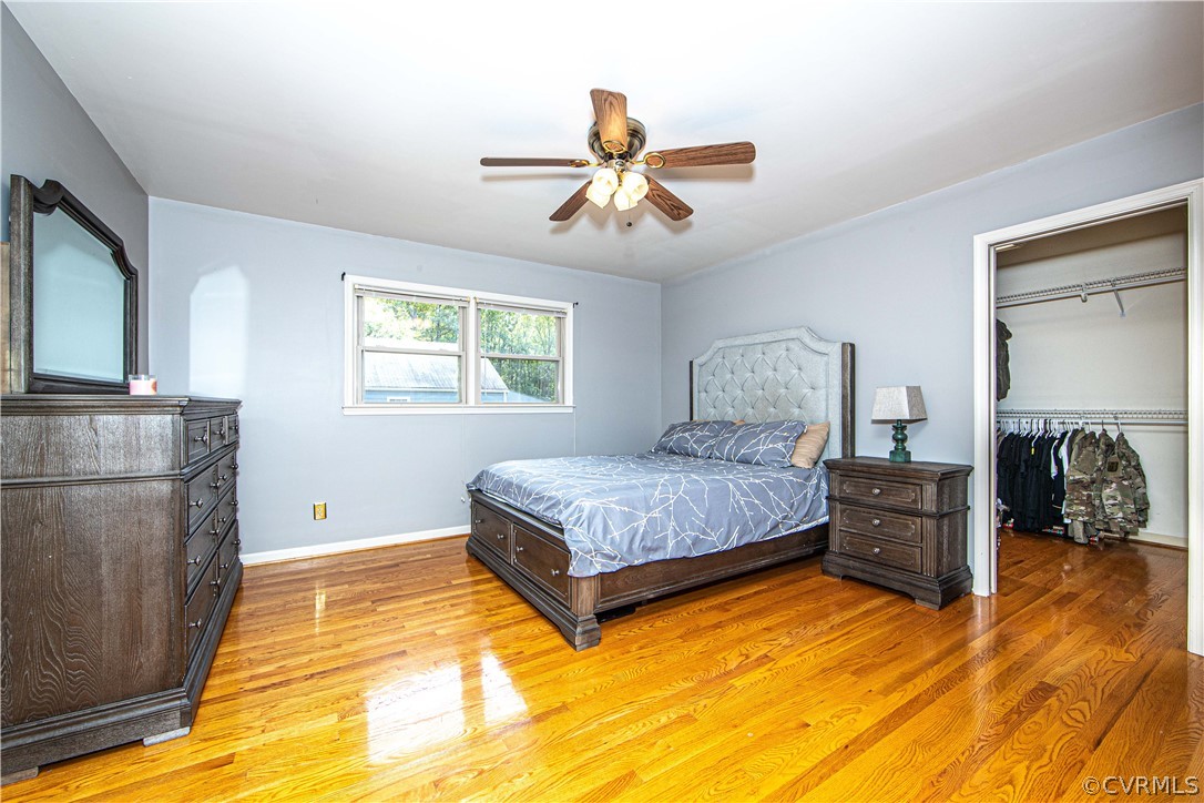 5605 Allin Road Prince George, VA 23875 - Photo 9 of 19 This fabulous primary bedroom features wood floors, a ceiling fan...