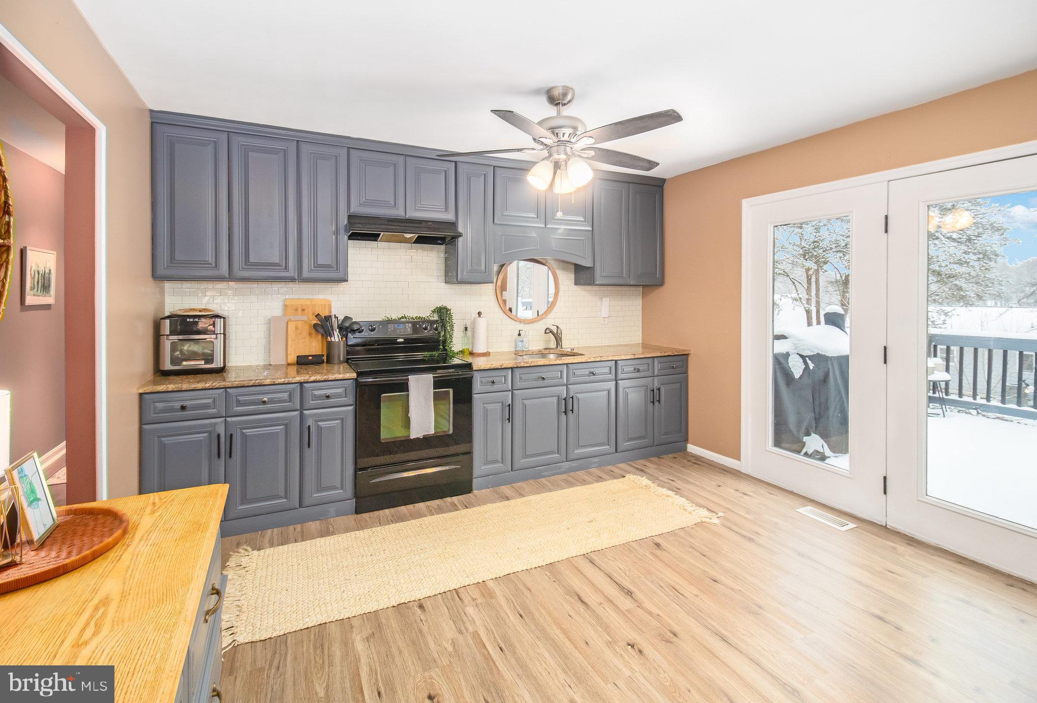 6811 Redground Road Fredericksburg, VA 22407 - Photo 8 of 37 42" Cabinets w/Soft Close Drawers & Ceiling Fan