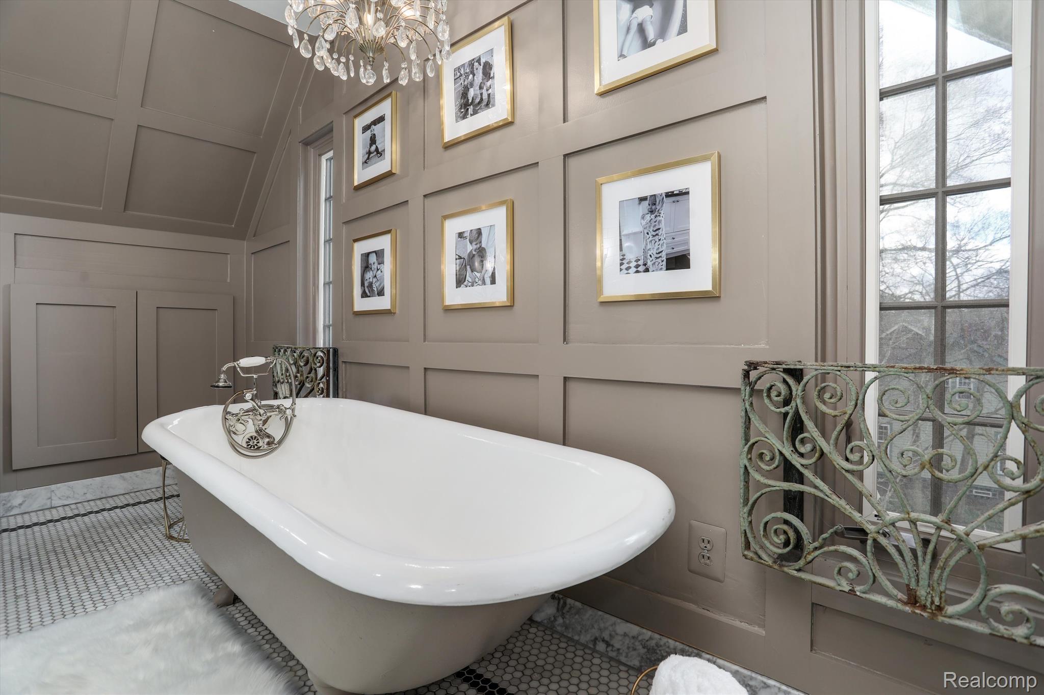 18 Ridge Road Pleasant Ridge, MI 48069 - Photo 36 of 54 Clawfoot tub w/ chandelier & scrolled iron railing