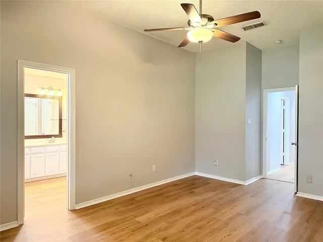 a bathroom with a double vanity sink and mirror